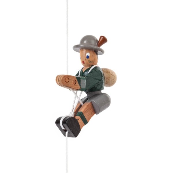 Climbing figure mountaineer, green jacket