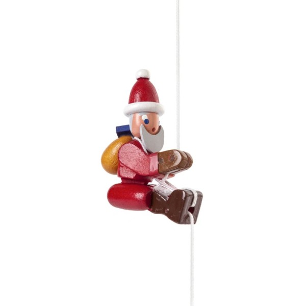 Figura di Babbo Natale che si arrampica